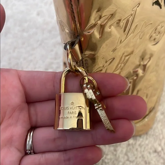 Louis Vuitton Gold Shoulder Bag with Iconic Monogram